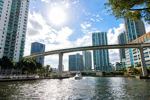 A stock photo of the Miami river in downtown Miami, Florida.